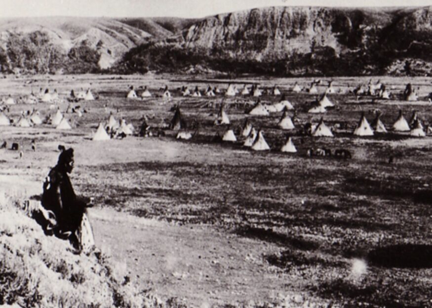 Sioux Man keeping watch over camp in Southern Saskatchewan.